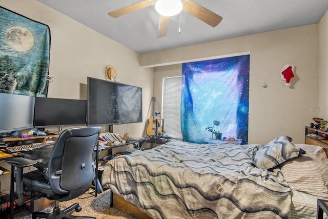 bedroom with a desk and a ceiling fan