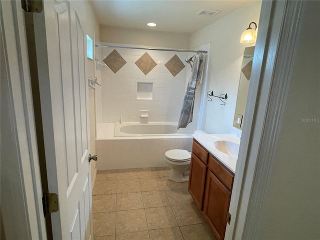 full bathroom with shower / tub combo with curtain, vanity, toilet, and tile patterned flooring