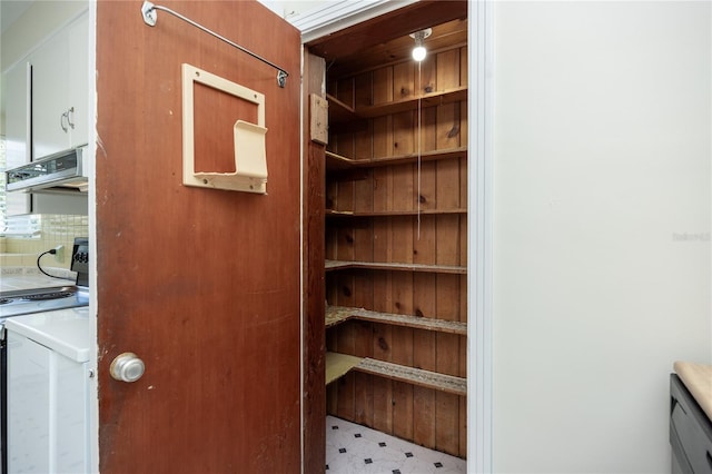 storage area featuring washer and clothes dryer