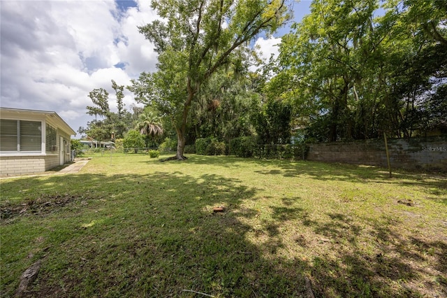 view of yard with fence