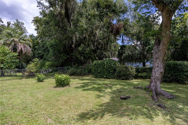 view of yard with fence