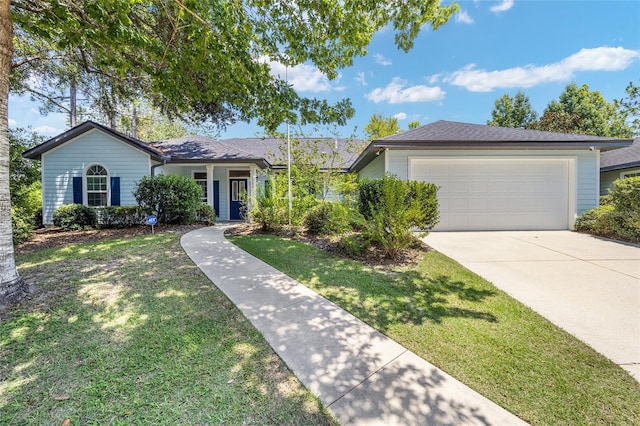 ranch-style house with a front yard and a garage