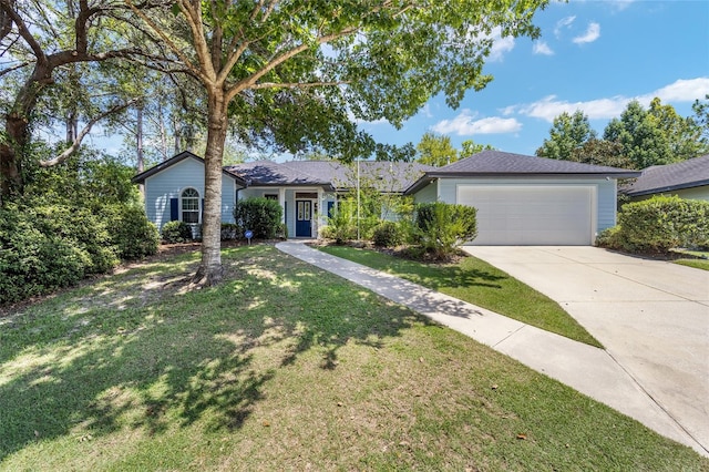 ranch-style home featuring a front yard and a garage