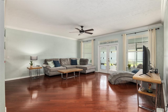 living room with hardwood / wood-style floors, french doors, ornamental molding, and ceiling fan