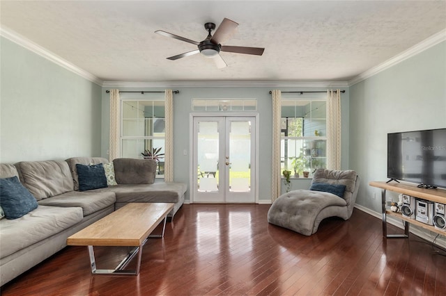 living room with ceiling fan, ornamental molding, french doors, and wood-type flooring