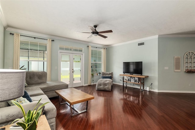 living room featuring ceiling fan, hardwood / wood-style flooring, ornamental molding, and french doors