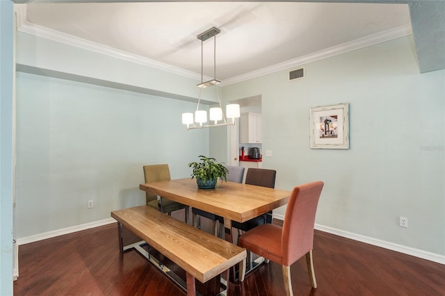 10545 NW 30th Ln, Gainesville, FL 32606 - dining space featuring ornamental molding, wood finished floors, and visible vents
