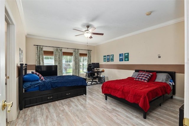 bedroom with light hardwood / wood-style flooring and ornamental molding