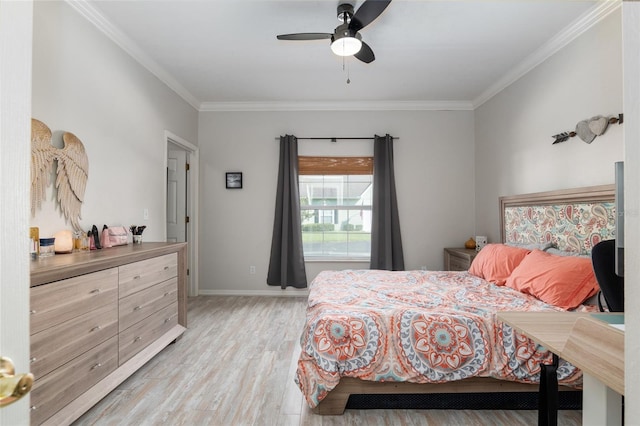 bedroom with ceiling fan, crown molding, and light hardwood / wood-style floors