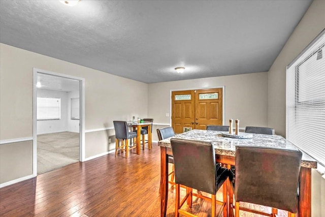 view of carpeted dining space