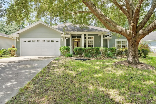 ranch-style house with a front lawn and a garage