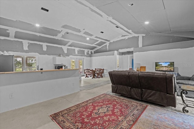 living room with lofted ceiling