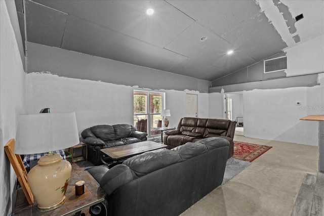 home theater room featuring lofted ceiling