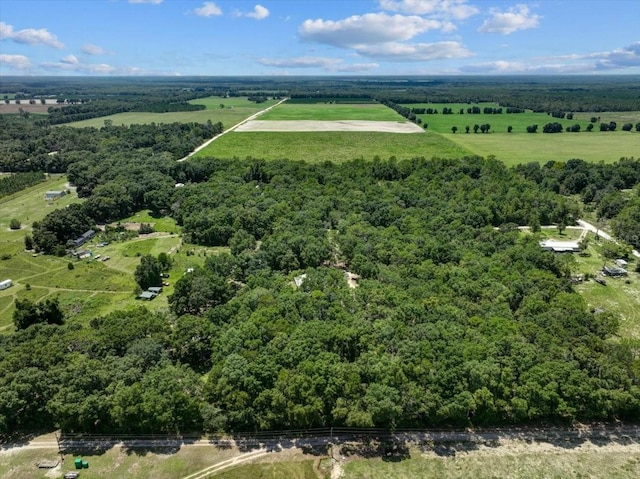 birds eye view of property featuring a rural view