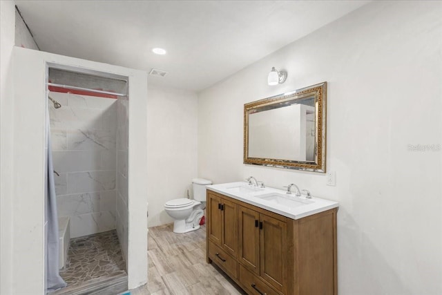 7340 NW 21st Ave, Bell, FL 32619 - full bathroom with a sink, a stall shower, toilet, and visible vents