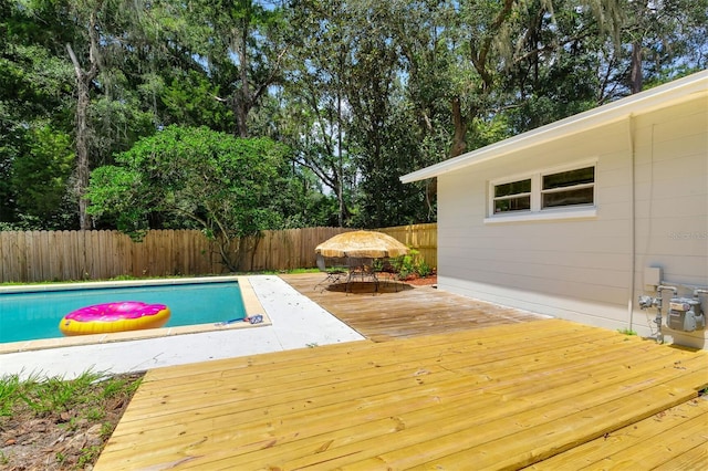 view of pool featuring a wooden deck