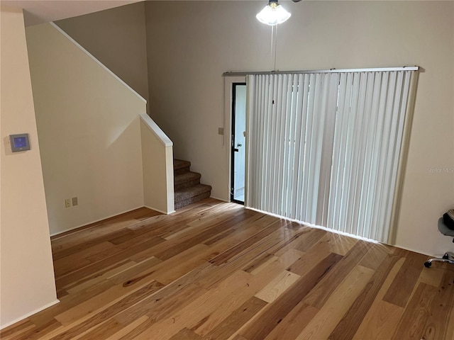 entryway with stairway and light wood-type flooring