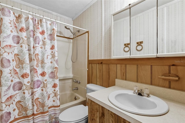 full bathroom featuring toilet, crown molding, shower / bath combination with curtain, and vanity