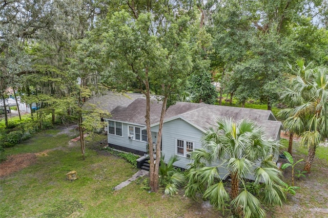 view of home's exterior featuring a lawn