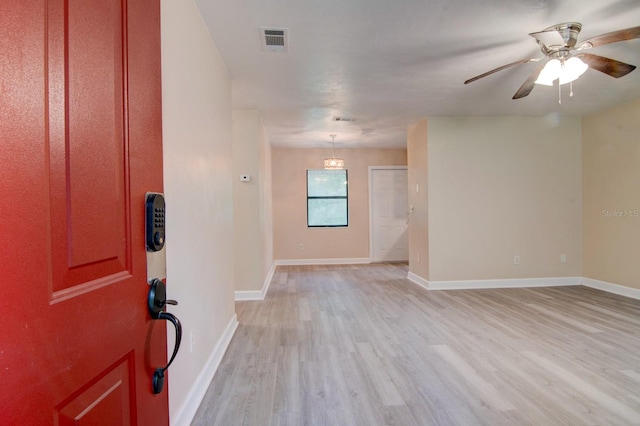 entrance foyer with ceiling fan and hardwood / wood-style flooring