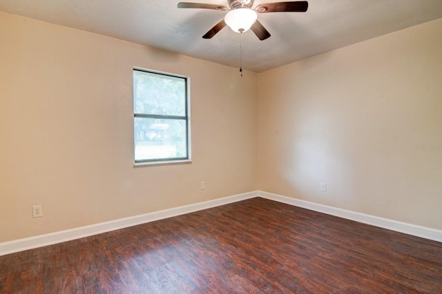 empty room with hardwood / wood-style flooring and ceiling fan