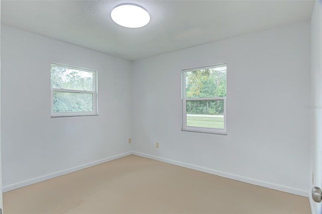 spare room with a wealth of natural light