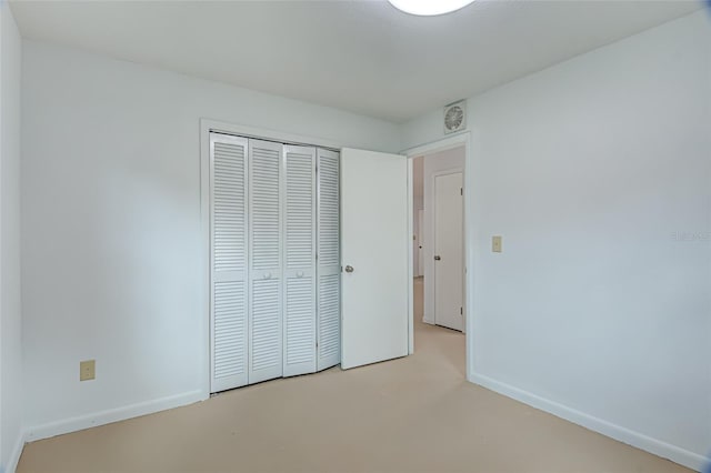 unfurnished bedroom featuring a closet