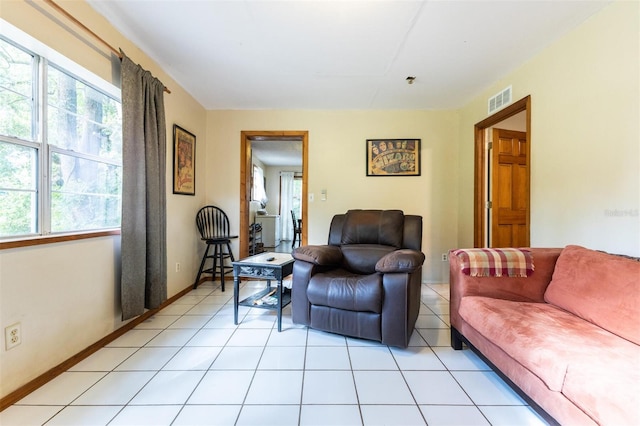 living room featuring light tile patterned floors