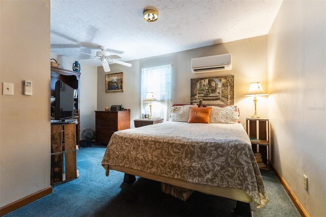 bedroom with a textured ceiling, carpet floors, ceiling fan, and a wall mounted AC