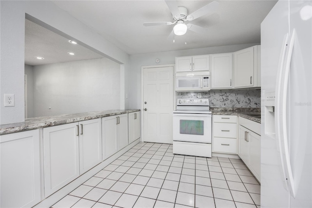 kitchen with white appliances, light tile patterned floors, ceiling fan, decorative backsplash, and white cabinets