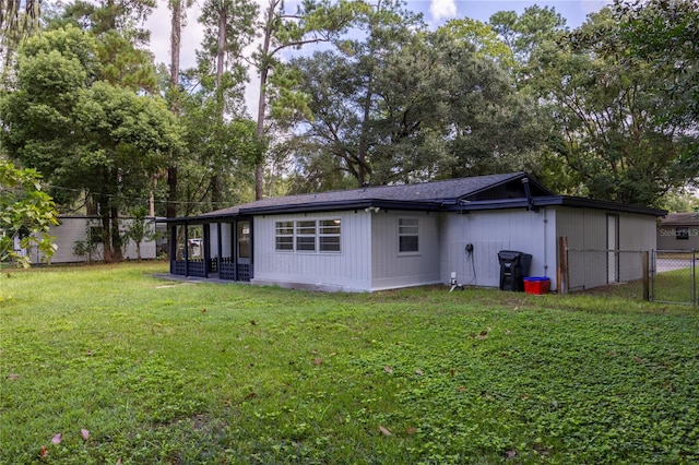 view of home's exterior with a yard