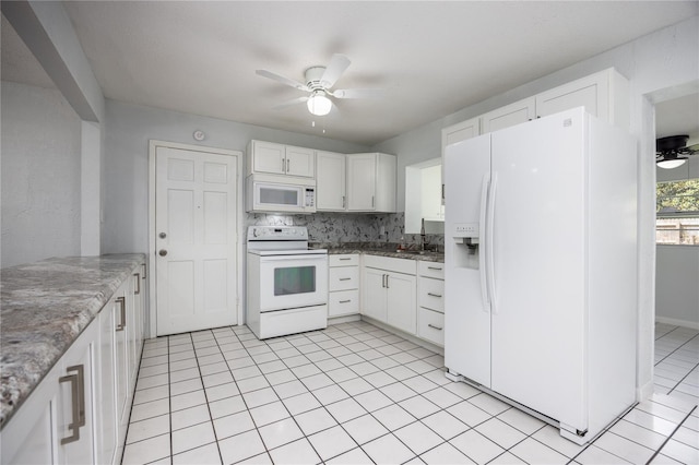 kitchen featuring white cabinets, ceiling fan, white appliances, and sink