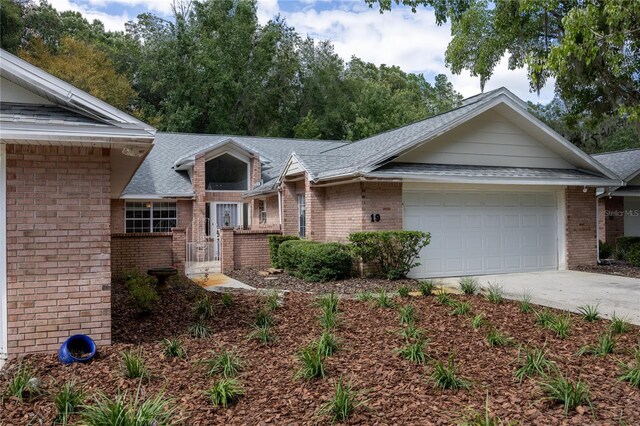 ranch-style home with a garage