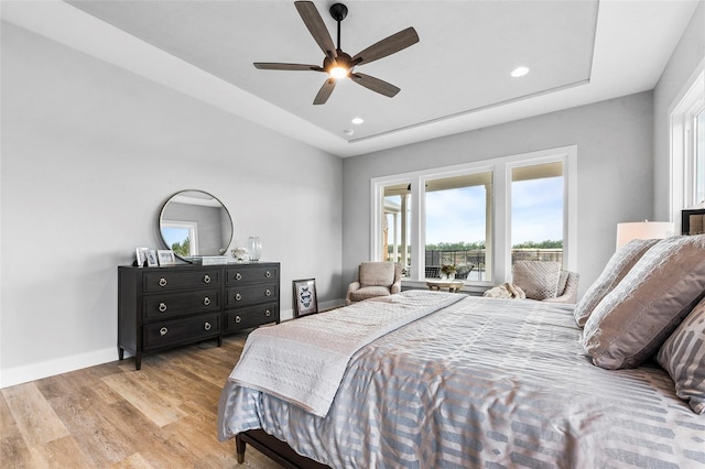 bedroom featuring light hardwood / wood-style floors and ceiling fan