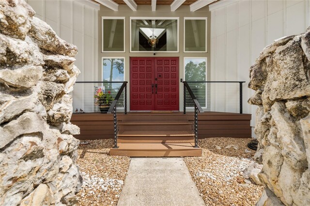 view of exterior entry featuring a porch