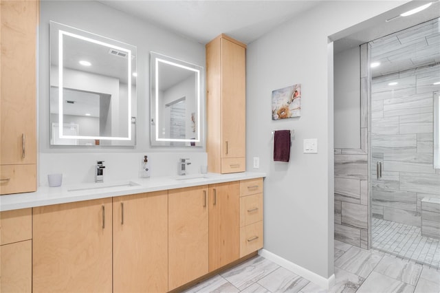 bathroom featuring vanity, tile patterned floors, and a shower with door