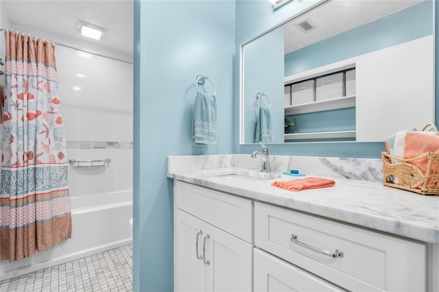 bathroom with vanity, shower / tub combo with curtain, and tile patterned floors