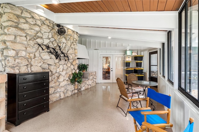 interior space featuring wood ceiling and vaulted ceiling