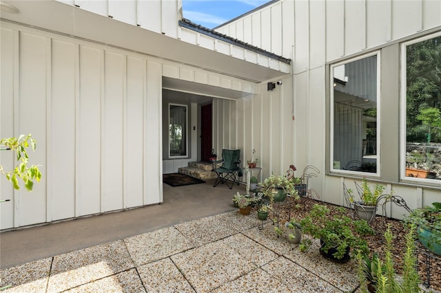 entrance to property with a patio