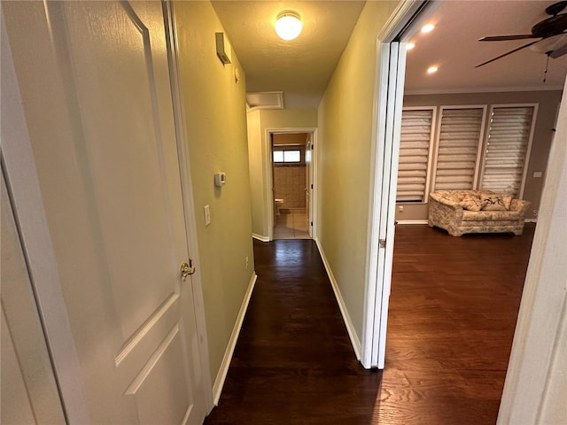 hallway with dark wood-type flooring