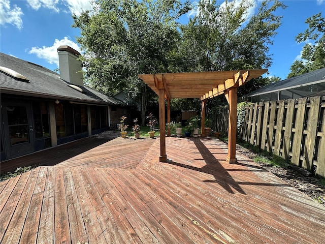 wooden terrace with a pergola