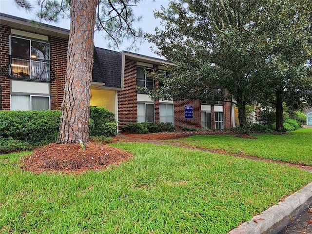 exterior space with a front yard