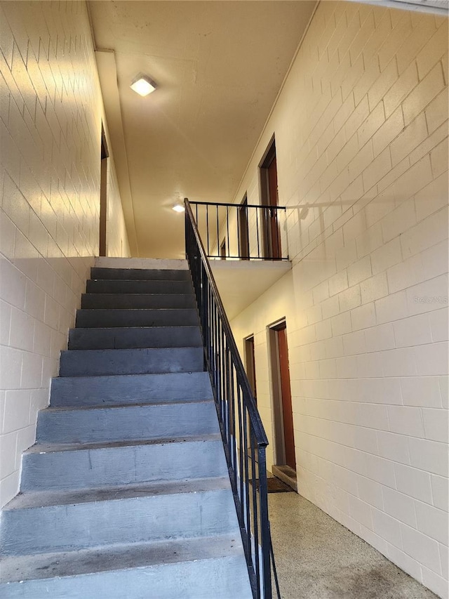 stairs with speckled floor