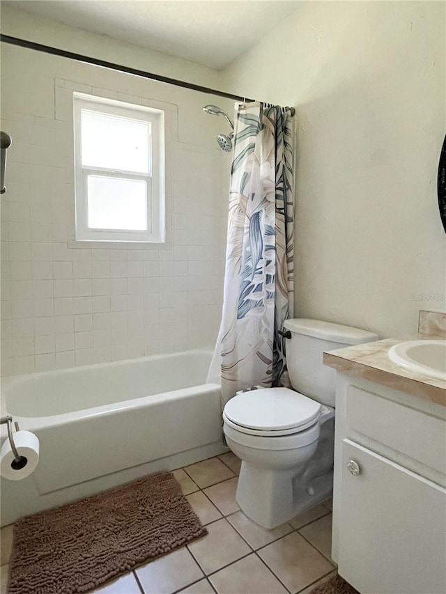 full bath featuring shower / bath combo with shower curtain, vanity, toilet, and tile patterned floors