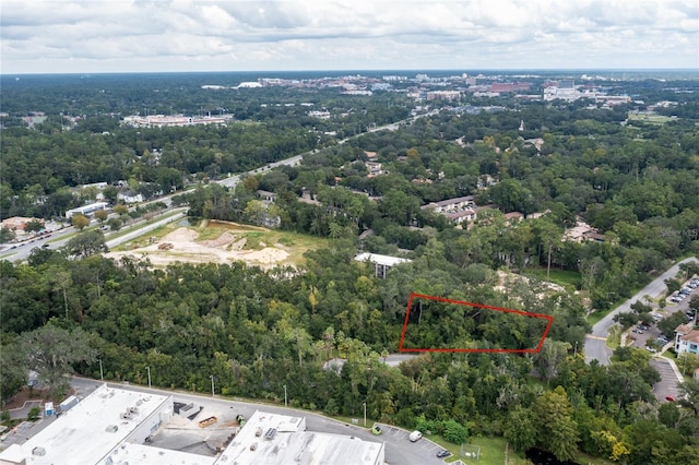 bird's eye view featuring a forest view