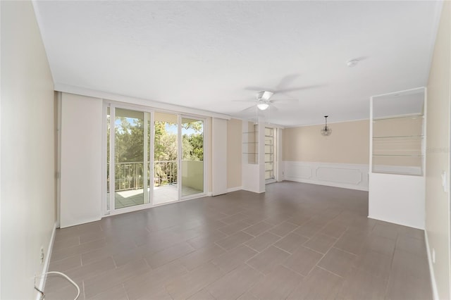 spare room featuring ceiling fan