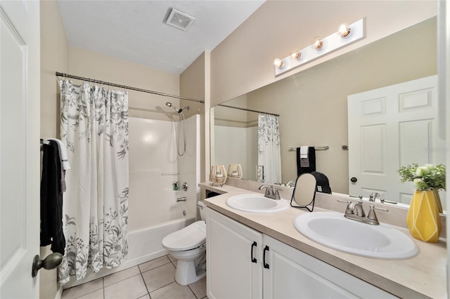 full bathroom featuring vanity, toilet, shower / bath combination with curtain, and tile patterned floors