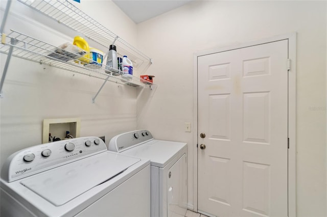 washroom featuring laundry area and washer and dryer