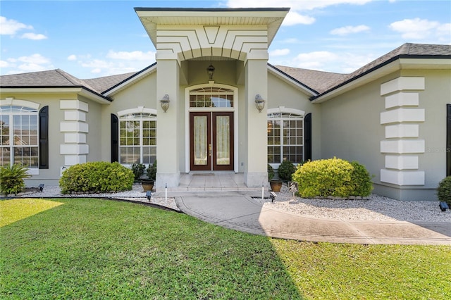 entrance to property with a yard