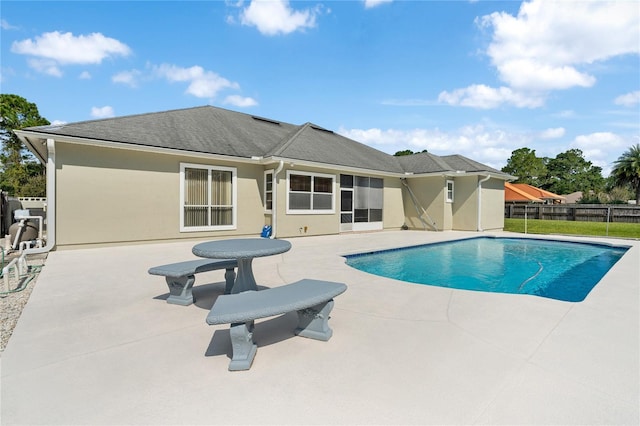 view of pool featuring a patio